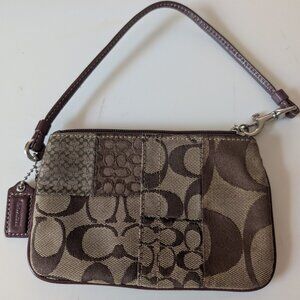 Coach Brown Monogram Wristlet (measures 6" x 4") zip closure